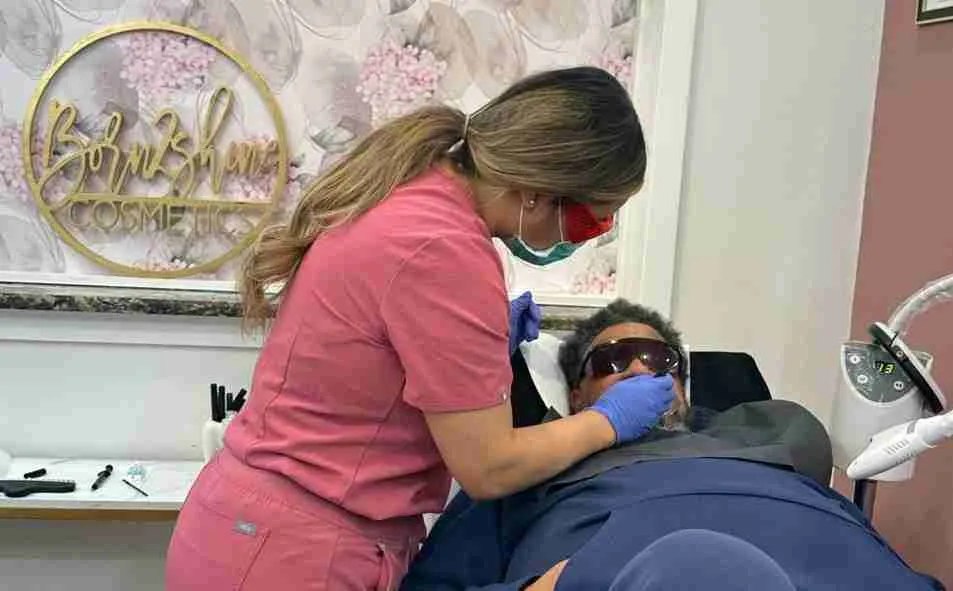 Nanci performing a one-on-one whitening session in the Born2Shine studio
